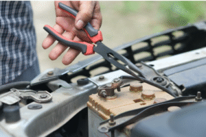 A mechanic working in a car repair shop in Pinellas Park.